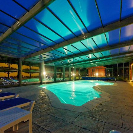 Hotel Logis Des Trois Maures Couches Exterior foto