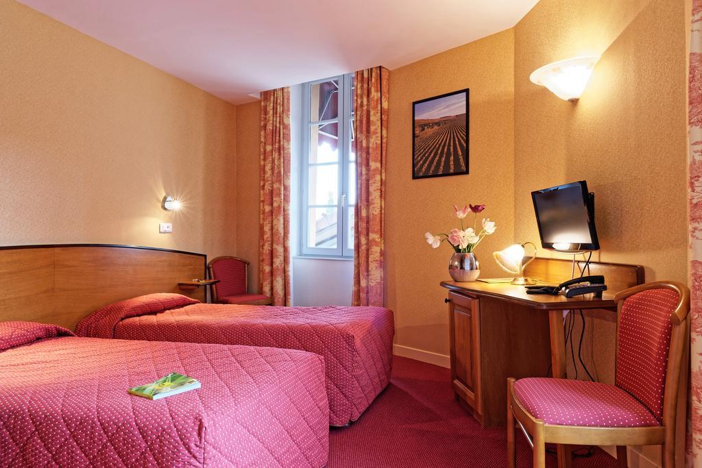 Hotel Logis Des Trois Maures Couches Exterior foto